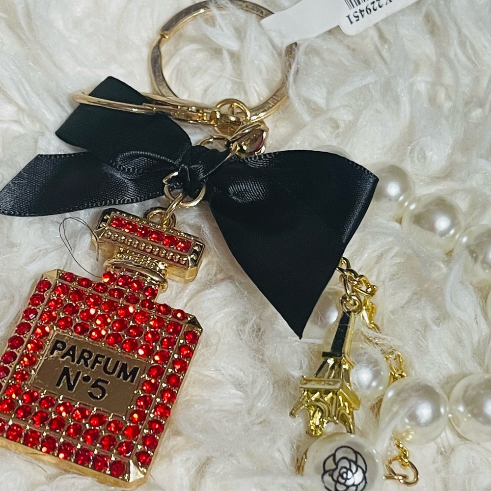 Elegant Red and Gold Keychain with Black Ribbon